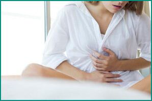 Pain due to postpartum cystitis in women
